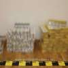 Două persoane cercetate, după ce eu fost văzute pe o stradă din municipiul Sighetu Marmației descărcând colete cu țigări de contrabandă