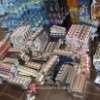 Peste 66.000 pachete țigări, 550.684 lei și sume în valută confiscate în urma a 14 percheziții în Maramureș